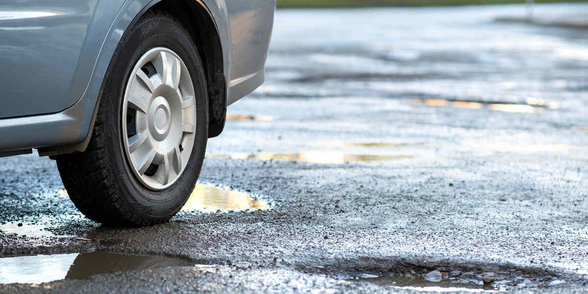 pothole damage to car